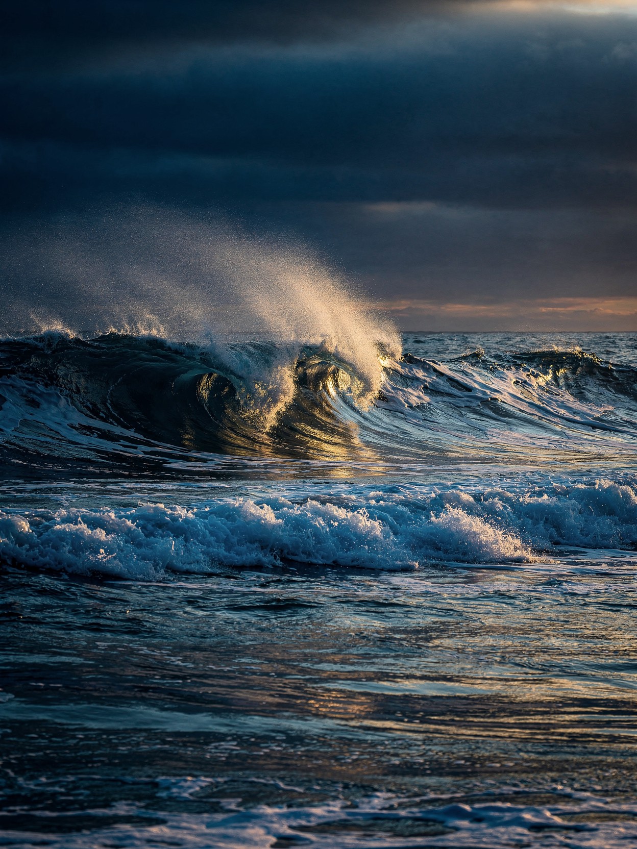 Ocean wave at sunset — the Tide Strategy in motion